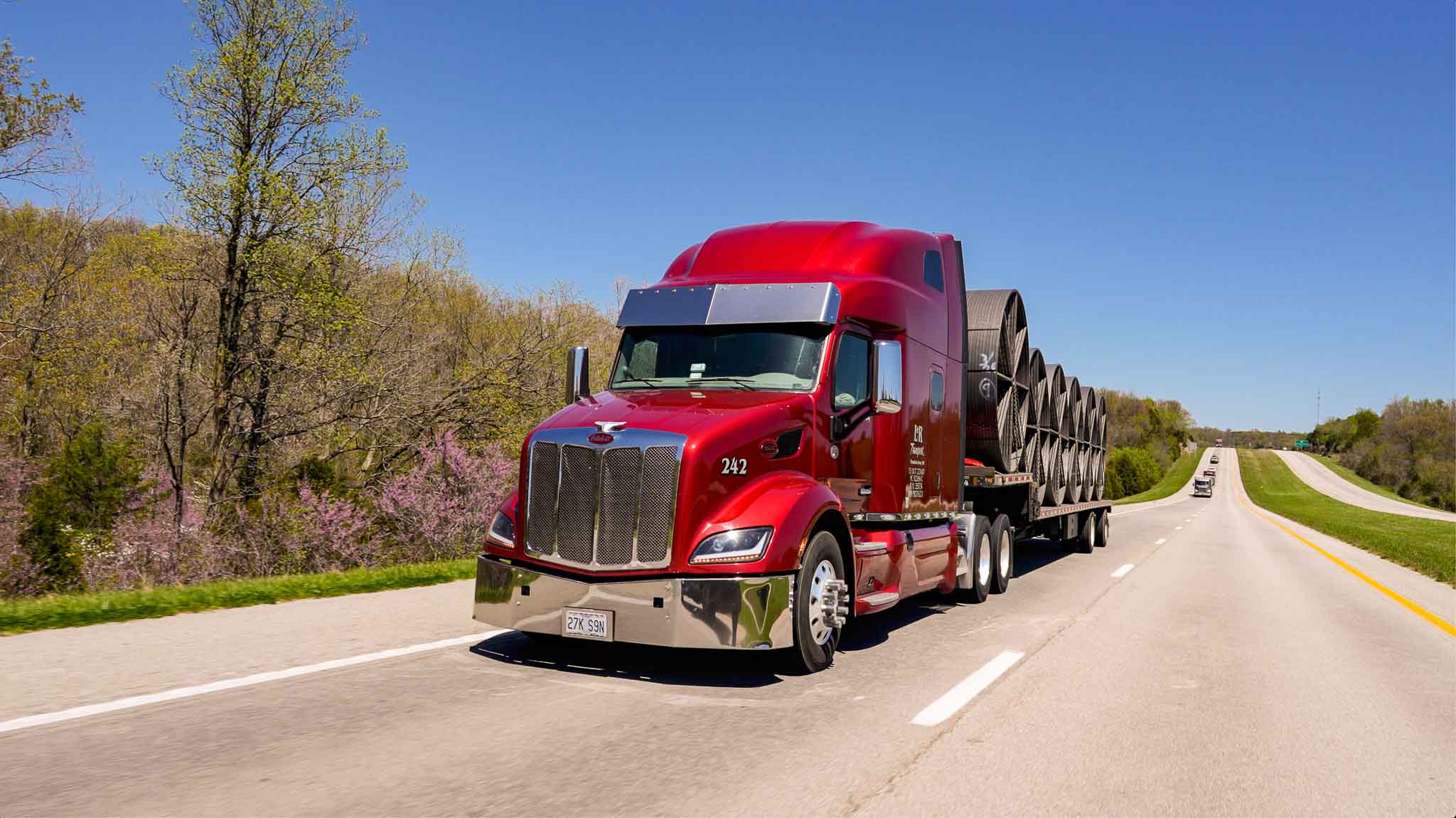 L&R Transport Peterbilt sleep cab tractors on the road